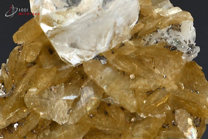 cristal de roche sur des cristaux translucides de siderite